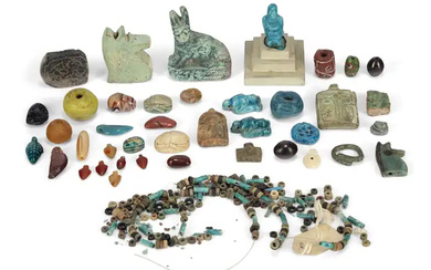 A group of ancient and later faience beads and amulets, Including 2...