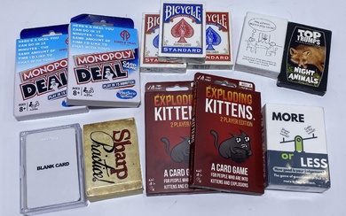 A group of card games/expansion decks marked Exploding Kittens etc.
