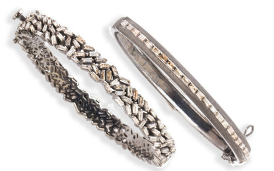 A group of diamond and blackened silver bangle bracelets