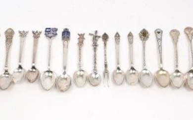 A group of silver and white metal souvenir spoons, including a Dutch example with windmill terminal, a Monaco example; several examples stamped 'Siam' and a 'Dresden' example, together with a set of seven silver coffee spoons with golf themed...