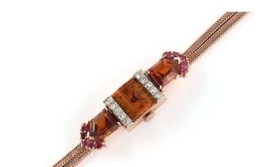 A lady's 14ct rose gold cocktail watch set with rubies, citr...