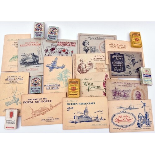 A large quantity of cigarette cards in albums, loose and for...