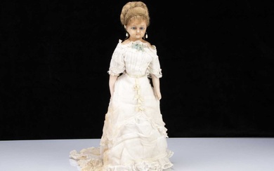 A late 19th century German wax over composition lady doll