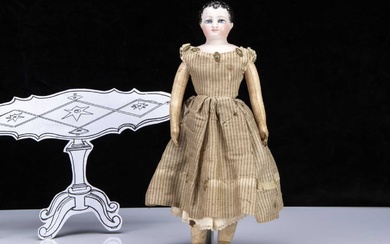 A late 19th century Petite French bisque shoulder-head doll
