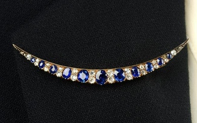 A late 19th century gold sapphire and old-cut diamond crescent moon brooch.Central sapphire