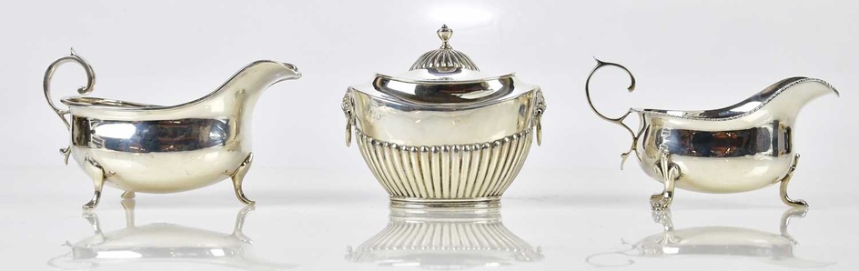 A late Victorian hallmarked silver tea caddy and cover with...