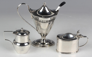 A late Victorian silver mustard of tapered faceted ovoid form, the hinged lid with flower bud finial