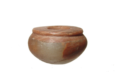 A lovely little Egyptian alabaster cosmetic vessel