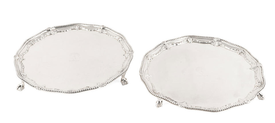 A matched pair of Irish and English George III silver...
