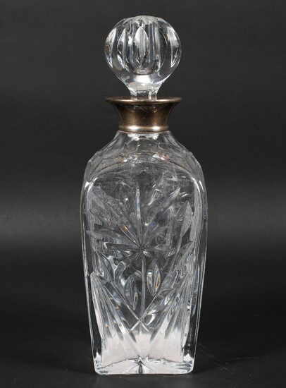 A mid century silver mounted glass decanter, the cut glass body decorated with floral sprays