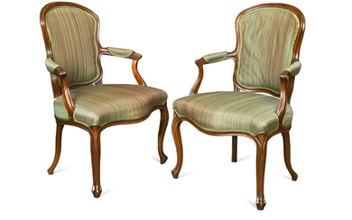 A near pair of George III style mahogany open armchairs, 19th century