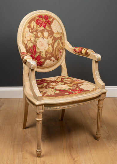 A painted French style armchair