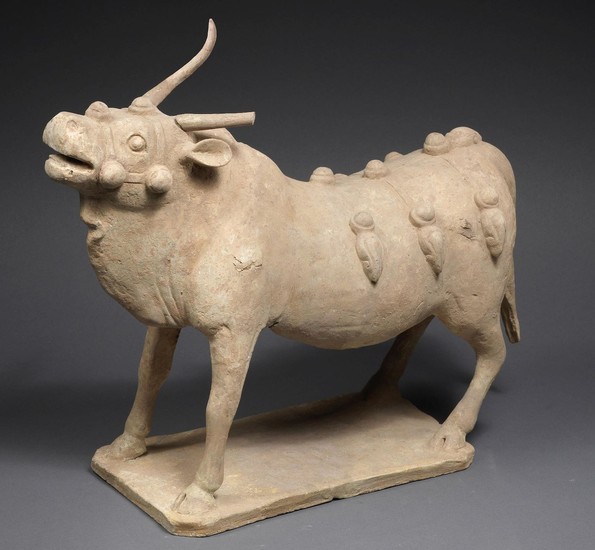 A painted pottery model of an ox