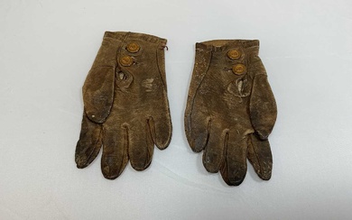 A pair of 19th century child's leather gloves, length 13cm.Condition...