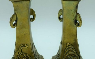 A pair of Chinese Tibetan bronze vases with elephant