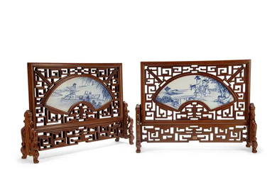 A pair of Chinese blue and white fan shaped table screens 20th...