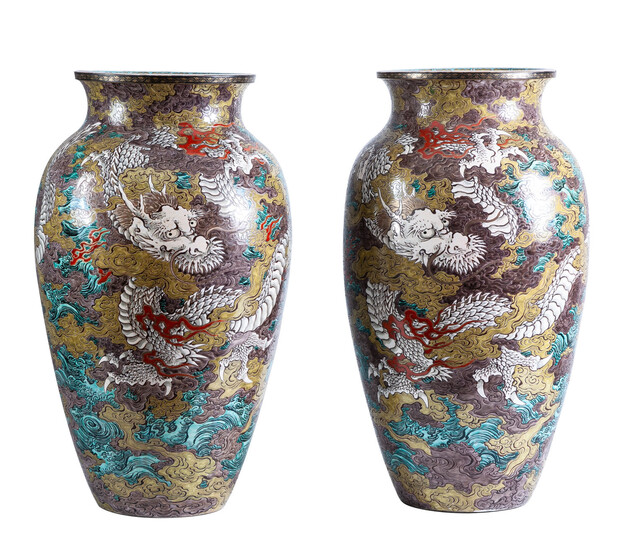 A pair of Chinese porcelain vases with dragons motifs,...