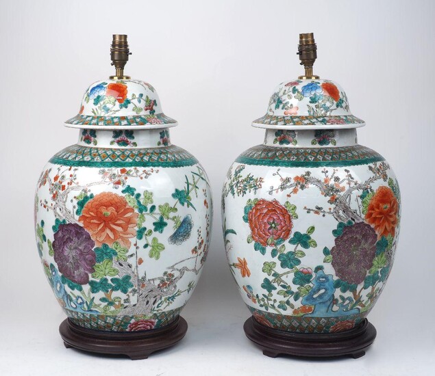 A pair of Chinese vase lamps, 20th century, each with domed cover, decorated with chrysanthemum designs overall, on hardwood bases, 49cm exc. fitment (2) It is the buyer's responsibility to ensure that electrical items are professionally rewired...