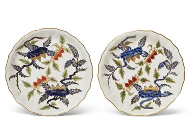 A pair of Derby porcelain plates decorated in Chinoiserie taste with the...
