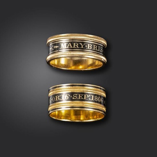 A pair of George III gold mourning rings, each with mourning inscription in black enamel, one dated 1809, 18ct London marks for 1809 and maker~s mark SG, size P 1/2, the other dated 1806, London marks for 1806, maker~s mark MG, size Q