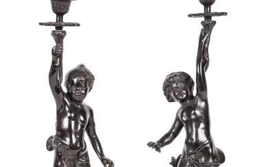 A pair of bronze candlesticks Circa 1900