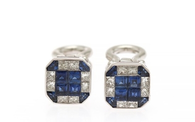 A pair of sapphire and diamond cufflinks each set with four carré-cut and four fancy-cut sapphires, and eight princess-cut diamonds, mounted in 18k white gold.