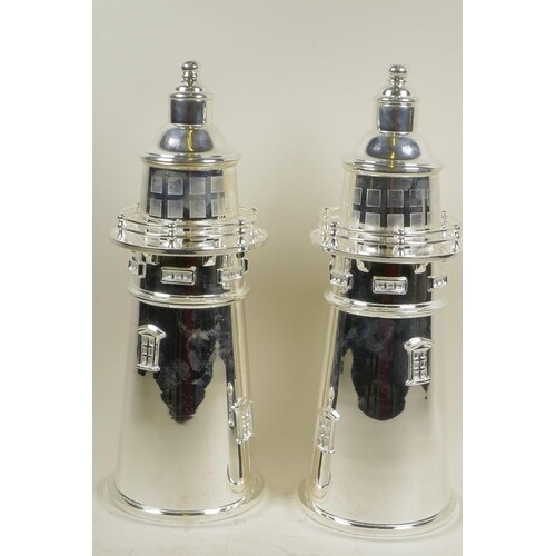 A pair of silver plated cocktail shakers in the form of ligh...