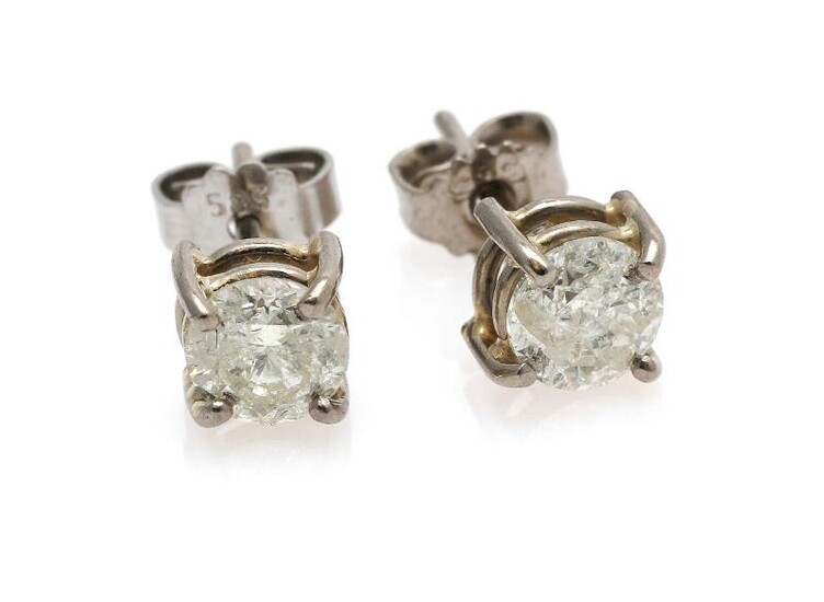 SOLD. A pair of solitaire diamond ear studs each set with a brilliant-cut diamond weighing a total of app. 1.30 ct., mounted in 14k white gold. Colour: L. Clarity: P. – Bruun Rasmussen Auctioneers of Fine Art