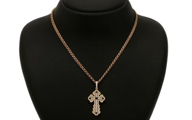 A pendant in the shape of a cross set with five synthetic sapphires, numerous diamonds and enamel, mounted in 14k gold. Accompanied by chain of 14k gold. (2)