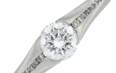 A platinum brilliant-cut diamond ring. Principal