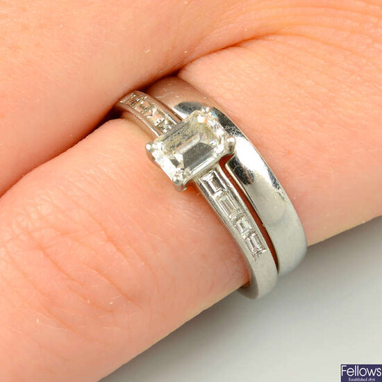 A platinum rectangular-shape diamond single-stone ring, with baguette-cut diamond shoulders and a fitted platinum band ring.