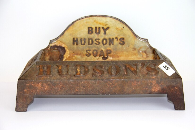 A rare original Hudson's cast iron dog bowl with foundry marks to the base, W. 41cm.