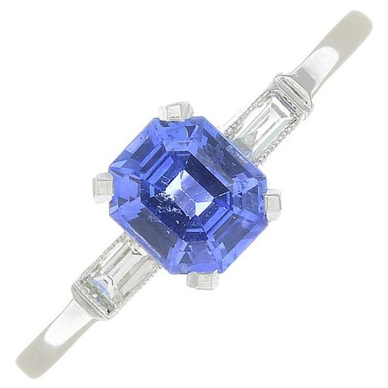 A sapphire and diamond dress ring.Sapphire weight