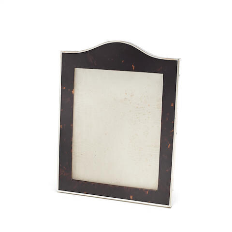 A silver-mounted tortoiseshell photograph frame