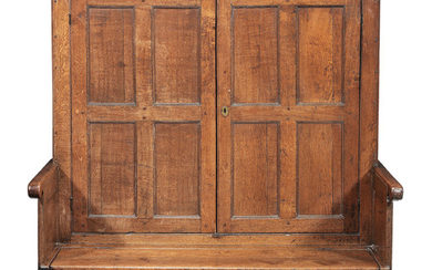 A small George III joined oak combination cupboard and settle, circa 1760