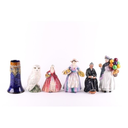 A small collection of Royal Doulton figures including "Cup o...
