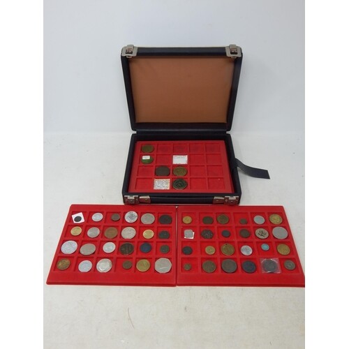 A small collectors coin case containing a good selection of ...