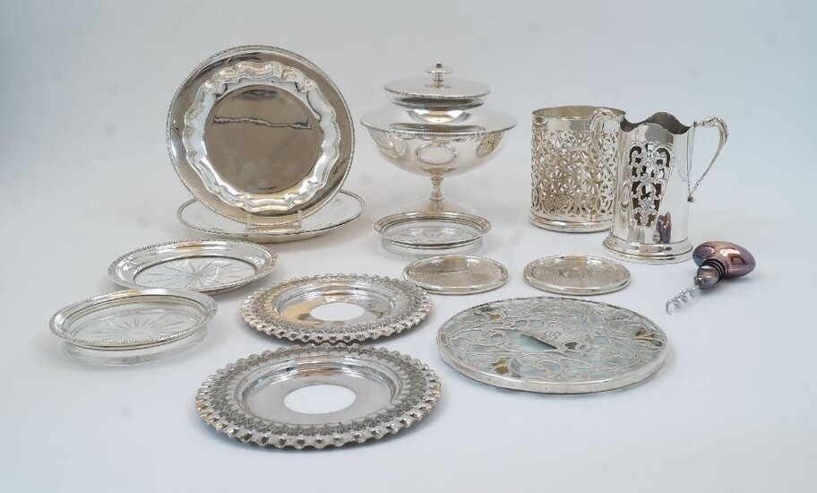 A small group of silver plate, to include: a small Mappin & Webb wine coaster, of pierced cylindrical form, 11.2cm high; two Mappin & Webb Prince's Plate circular dishes, 18.7cm dia.; a footed bon bon dish with cover with knopped finial and...