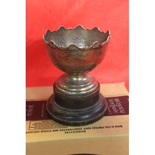 A sterling silver hallmarked footed presentation bowl with o...