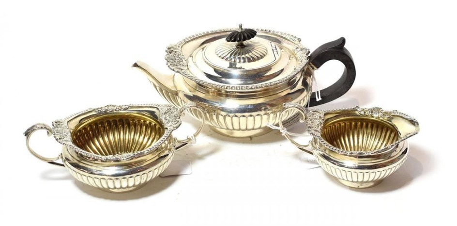 A three-piece Victorian silver tea-service, by Walter and John Barnard,...