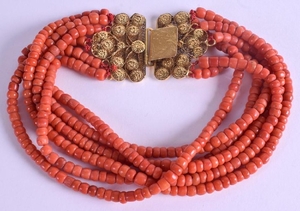 AN 18CT GOLD CHINESE RED CORAL NECKLACE. 150 grams. 35