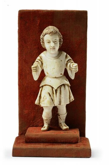 AN INDO-PORTOGUESE IVORY CARVING OF INFANT JESUS AS