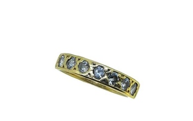 An 18ct gold seven stone diamond ring, grain set round brilliant cut diamonds, estimated approximate
