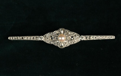 An Art Deco Diamond encrusted Brooch centred by a pearl.