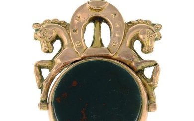 An Edwardian 9ct gold carnelian and bloodstone swivel fob, with horse and horseshoe motif surmount.