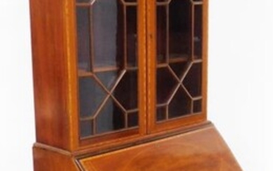 An Edwardian mahogany bureau bookcase, with satinwood cross banding,...