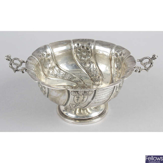 An Edwardian silver twin-handled pedestal bowl.