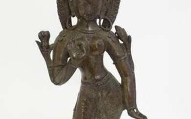 An Indian cast bronze model of a standing deity figure