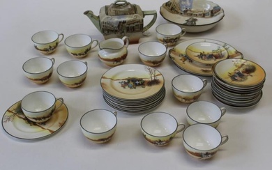 An early 20th century Royal Doulton Coaching Scenes tea service,...