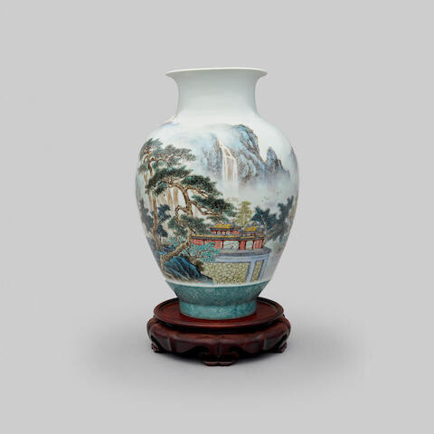 An enamelled 'landscape' ceramic vase